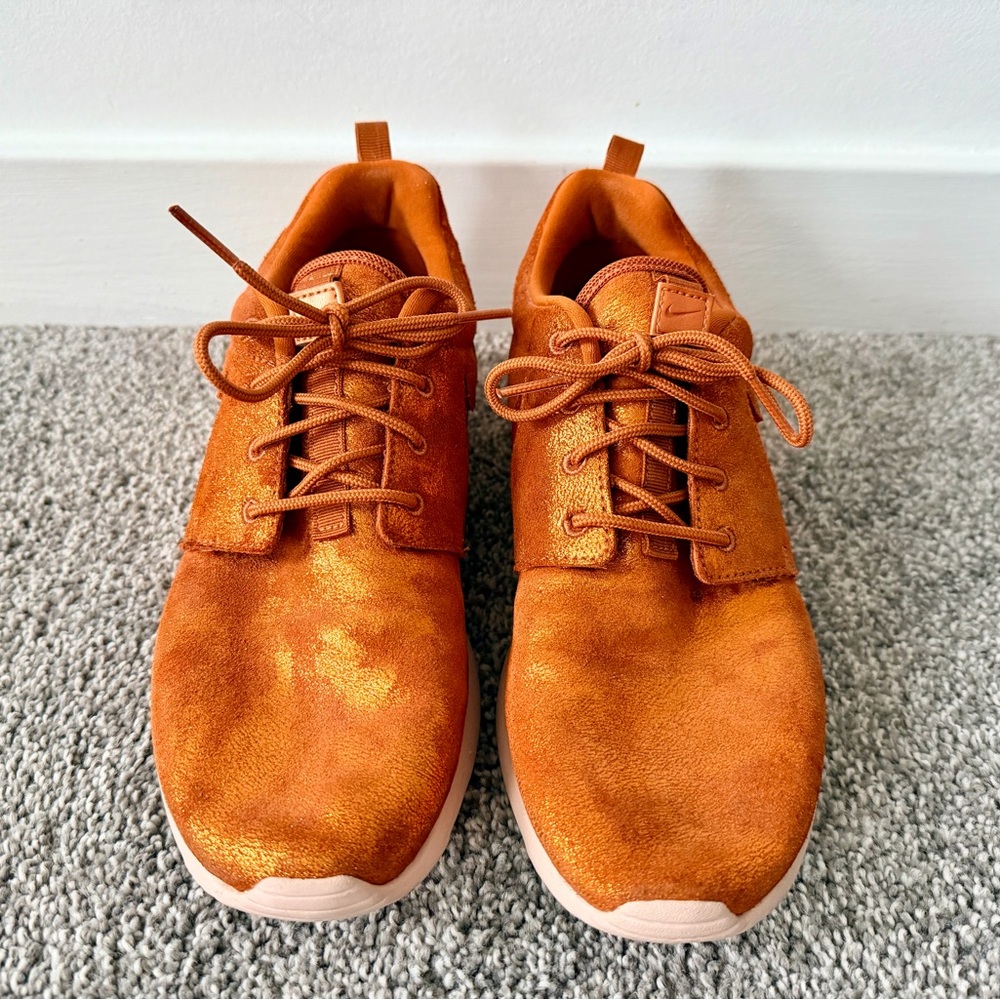 Nike Women's Metallic Orange Sneakers